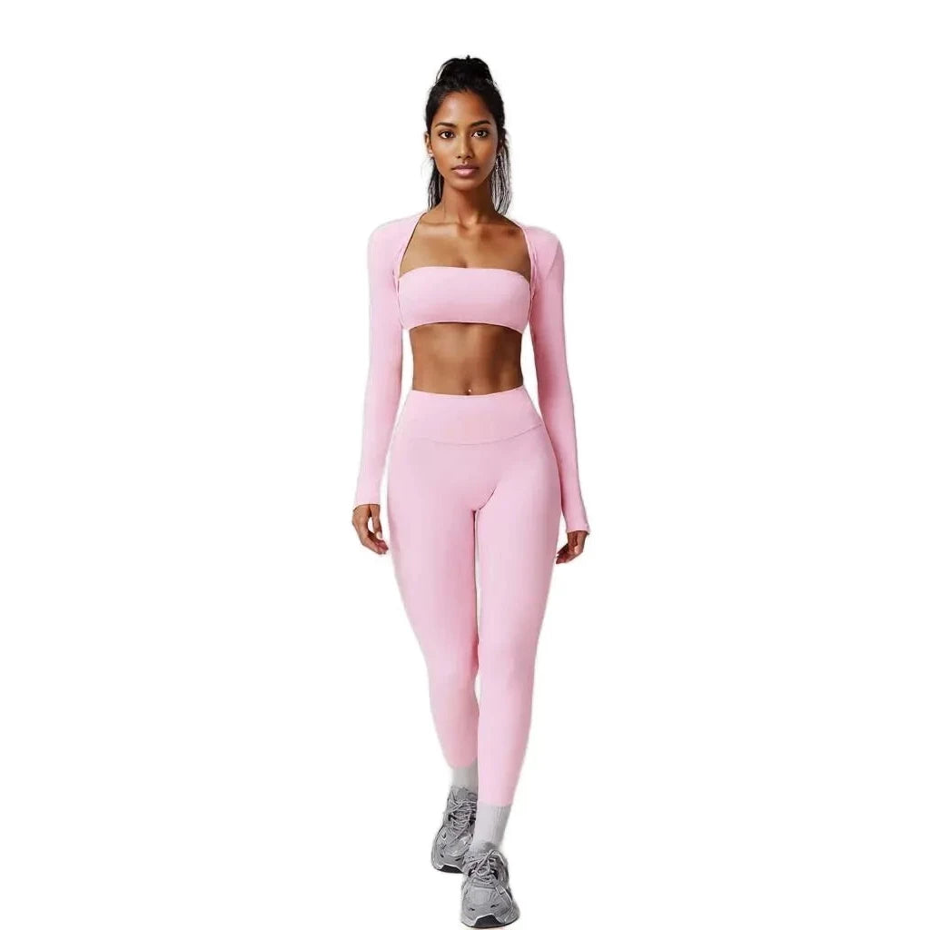 Xooie Fit 3-piece workout outfit in pink featuring a long sleeve top, sports bra, and leggings