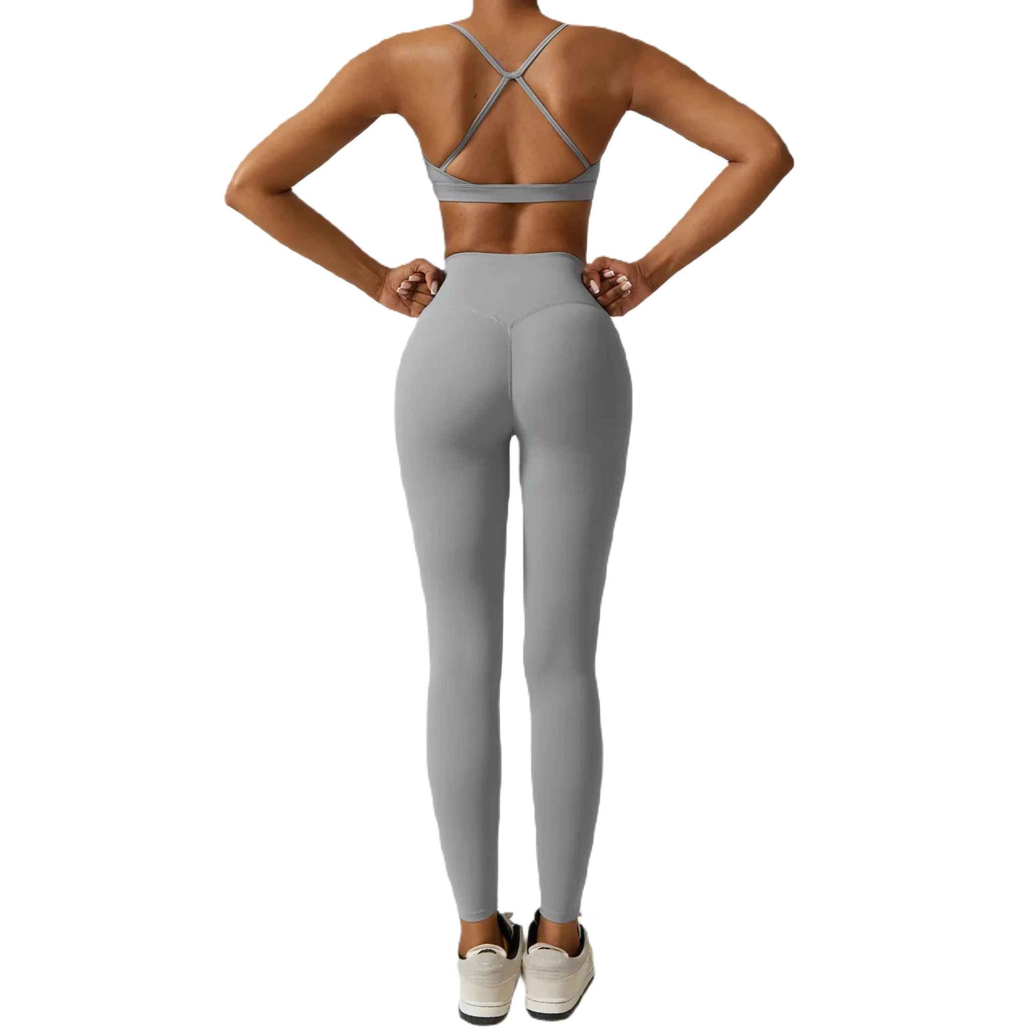 Back view of grey women's fitness three-piece set from Xooie Fit featuring a strappy crop top and leggings
