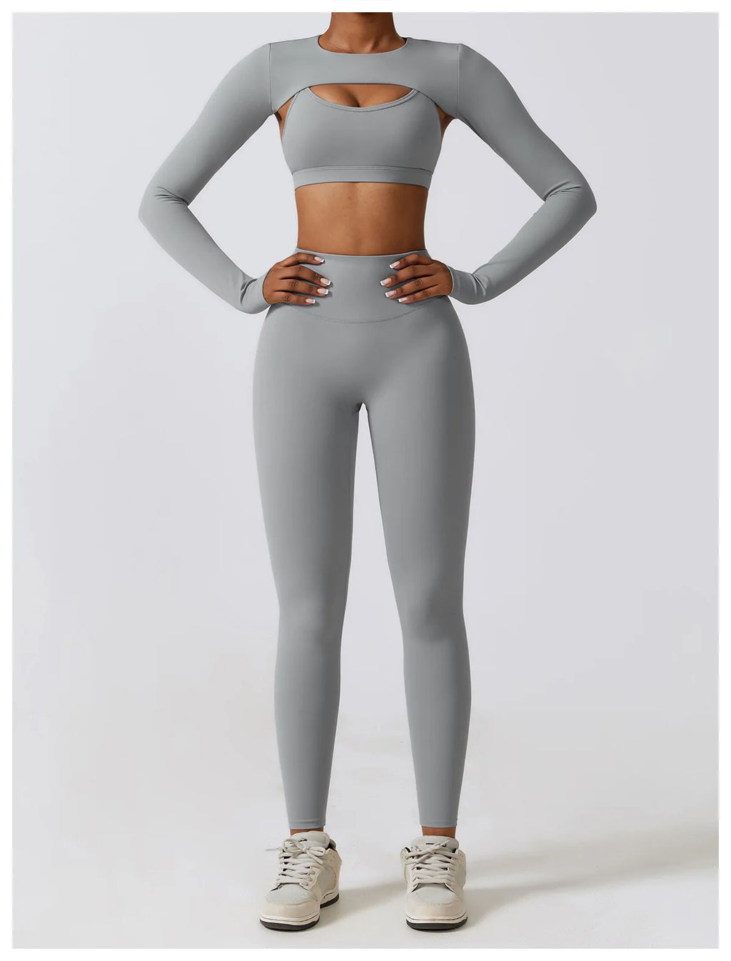 Xooie Fit women's fitness three-piece set in grey featuring a long-sleeve crop top and high-waisted leggings