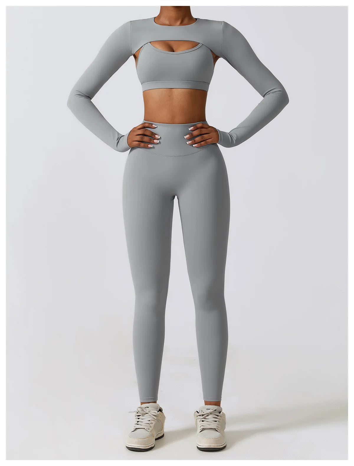 Xooie Fit women's fitness three-piece set in grey featuring a long-sleeve crop top and high-waisted leggings