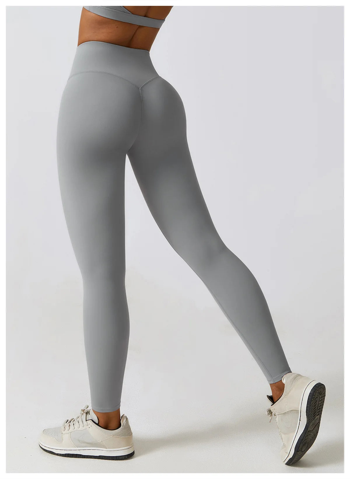 Xooie Fit women's fitness three-piece set in grey featuring a long-sleeve crop top and high-waisted leggings - legging view