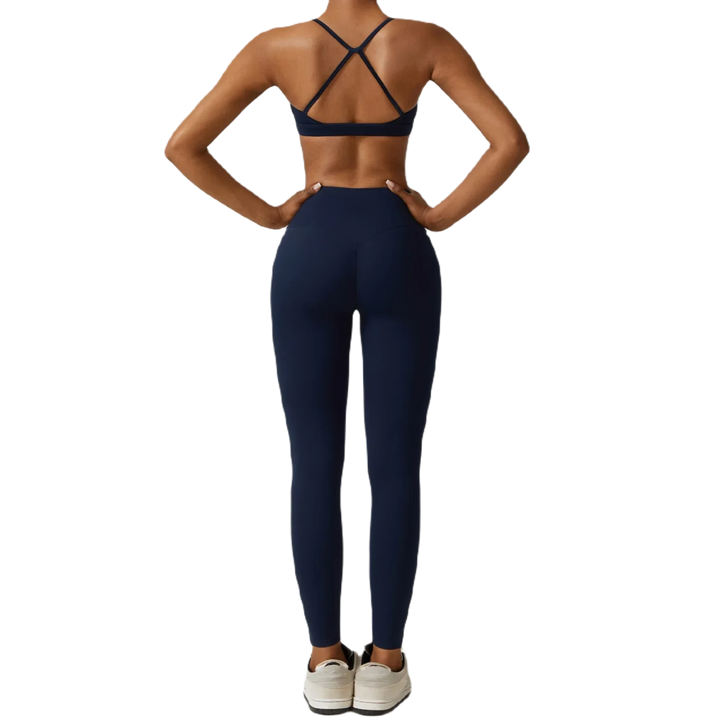 Xooie Fit women's fitness three-piece set in navy blue featuring stylish crop top and leggings