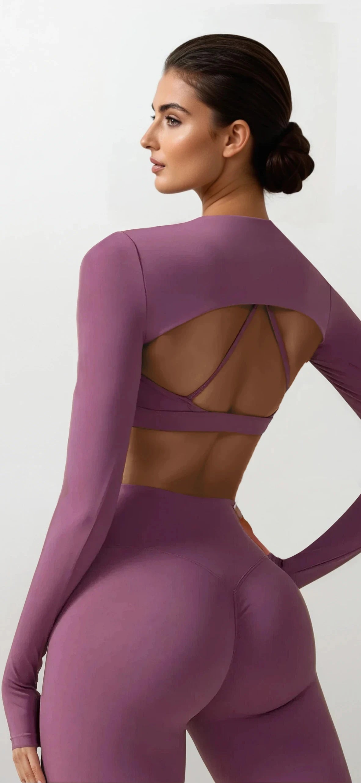Xooie Fit women's fitness three-piece set in purple with a stylish cutout back design