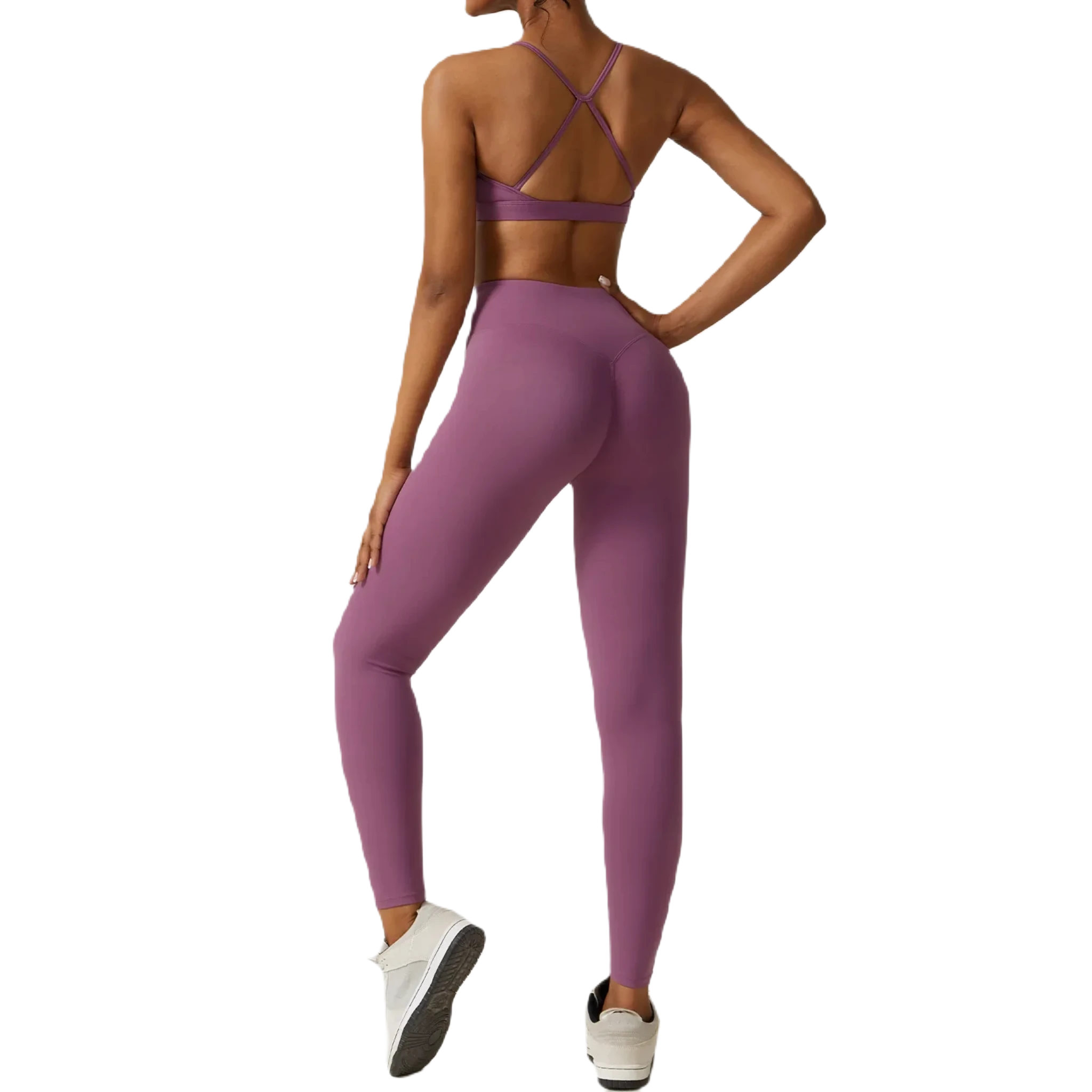 Back view of women's fitness three-piece set in purple, featuring a stylish sports bra and leggings