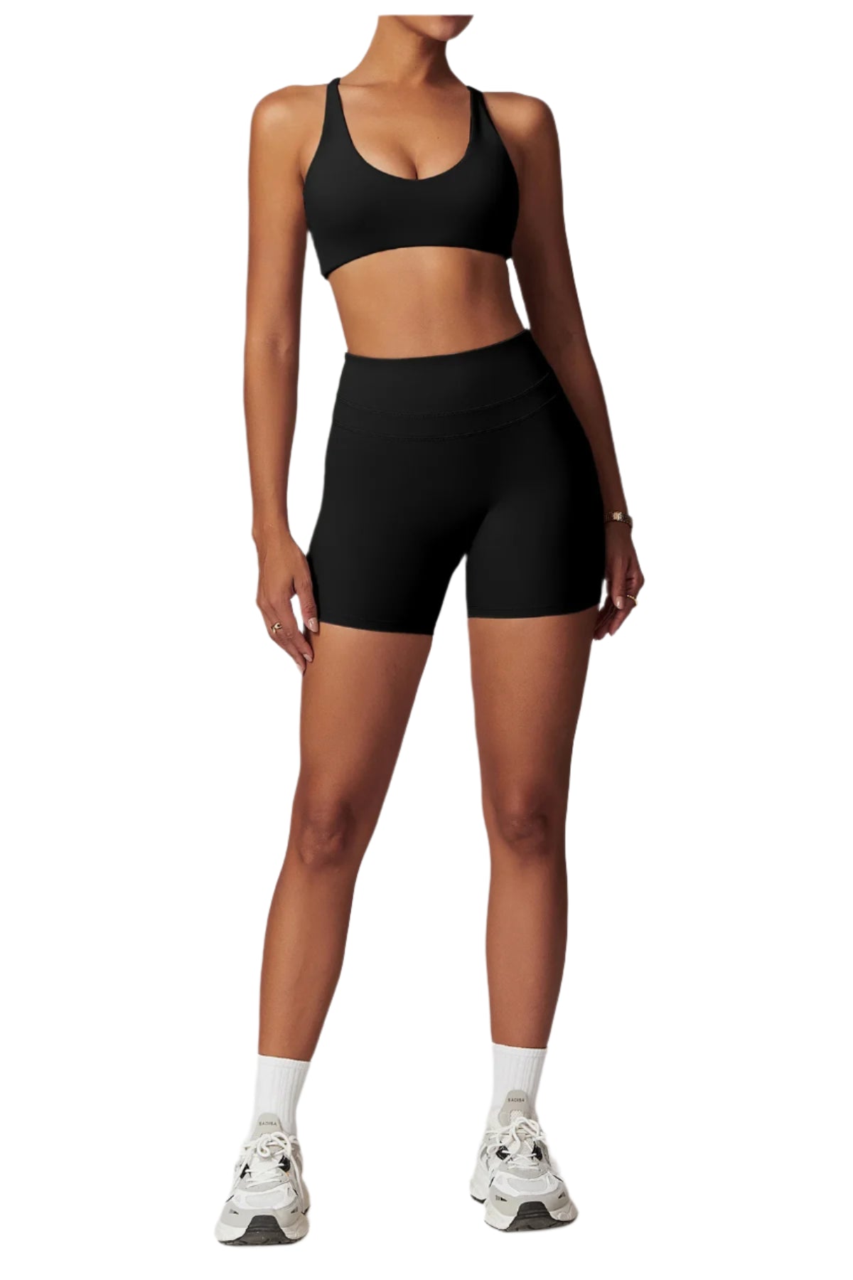 Women's fitness two-piece set in black, featuring a sports bra and high-waisted shorts for comfortable workouts