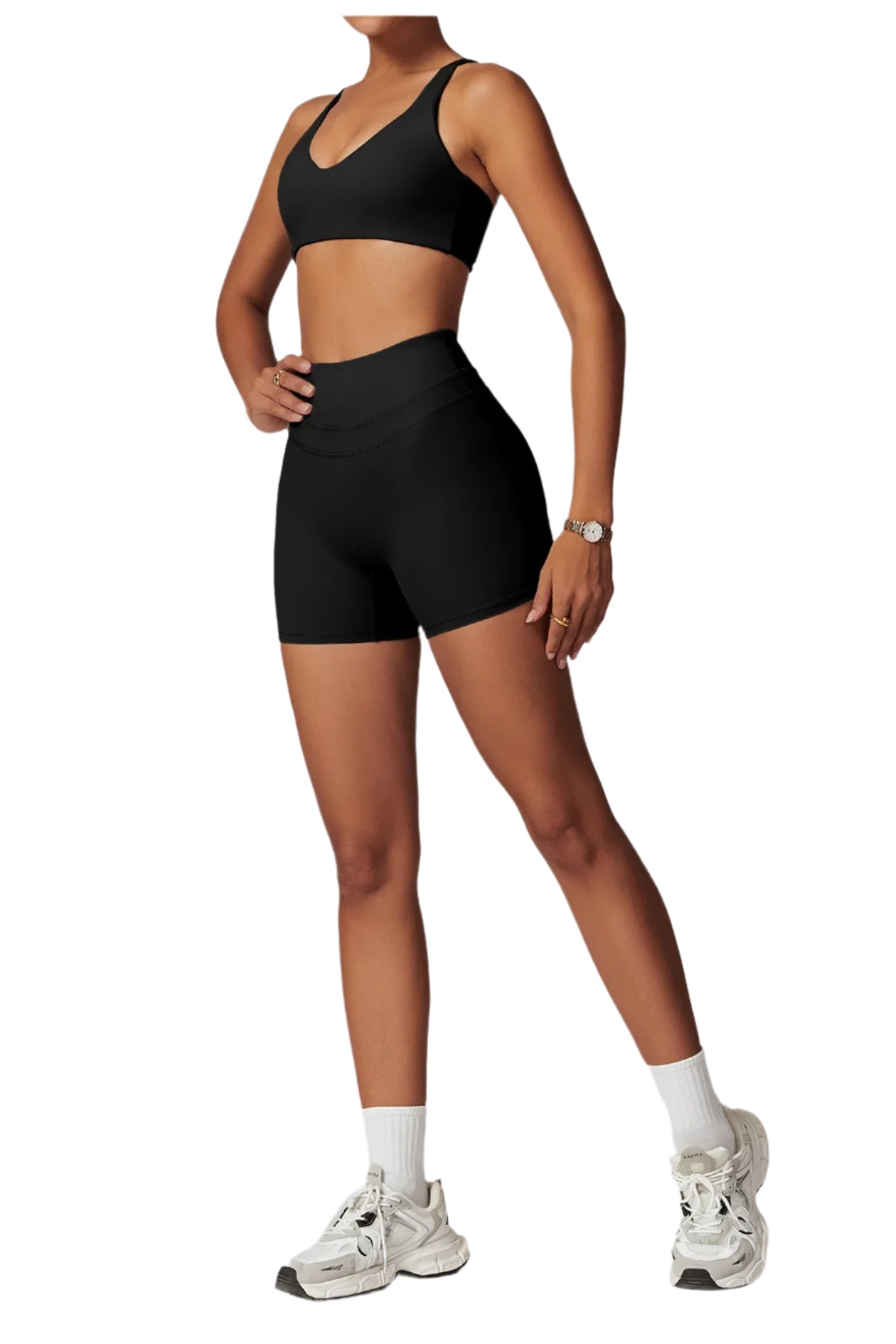 Black women's fitness two-piece set featuring a sports bra and high-waisted shorts for comfort and style