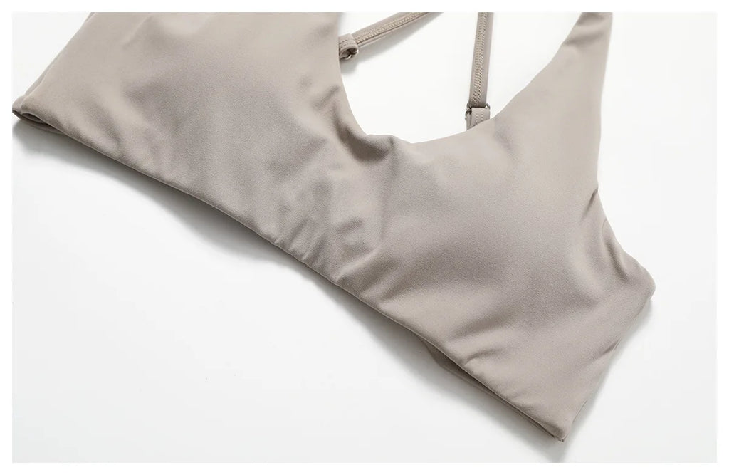 Xooie Fit women's fitness two-piece set featuring a stylish and comfortable beige sports bra