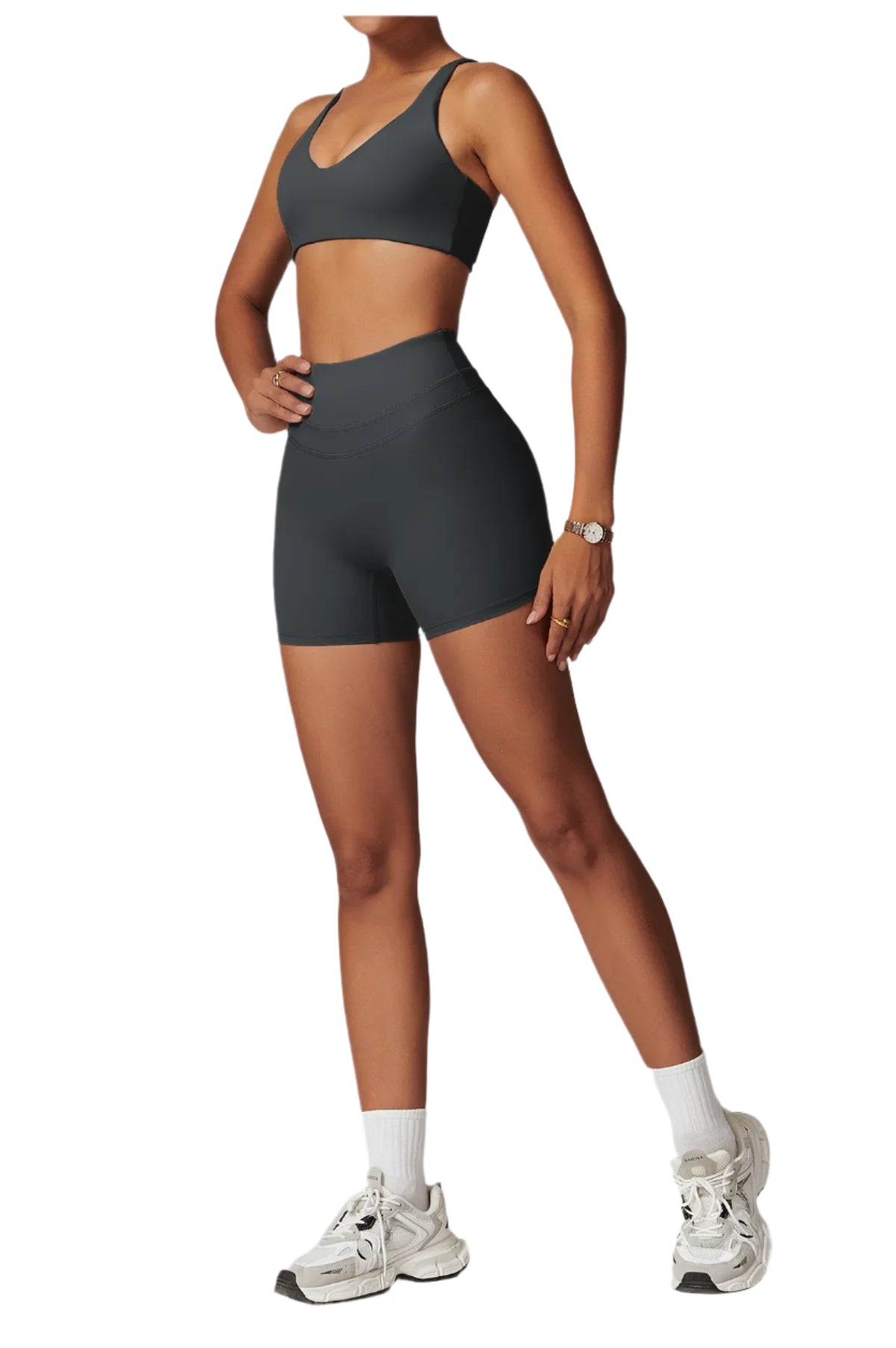 Women's fitness two-piece set in dark gray featuring a sleek sports bra and high-waisted shorts
