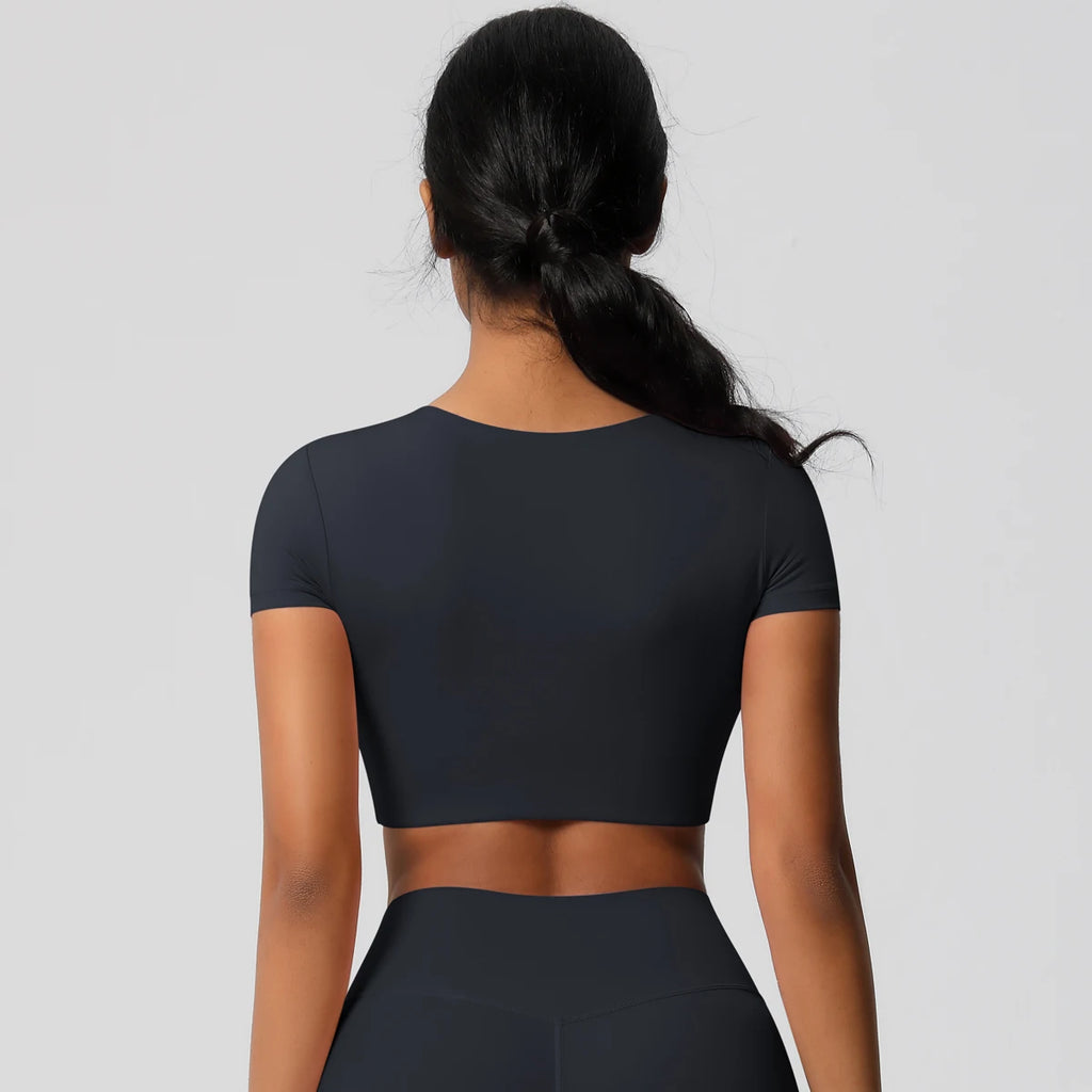 Back view of Xooie Fit yoga crop top t-shirt in black, perfect for yoga and activewear