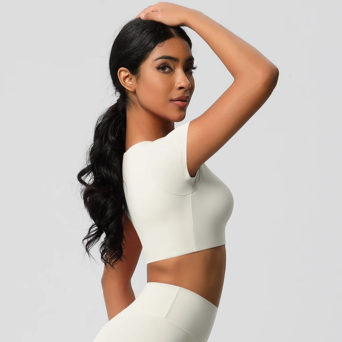 Xooie Fit women's yoga crop top t-shirt in white with a stylish, cropped design for comfortable workouts