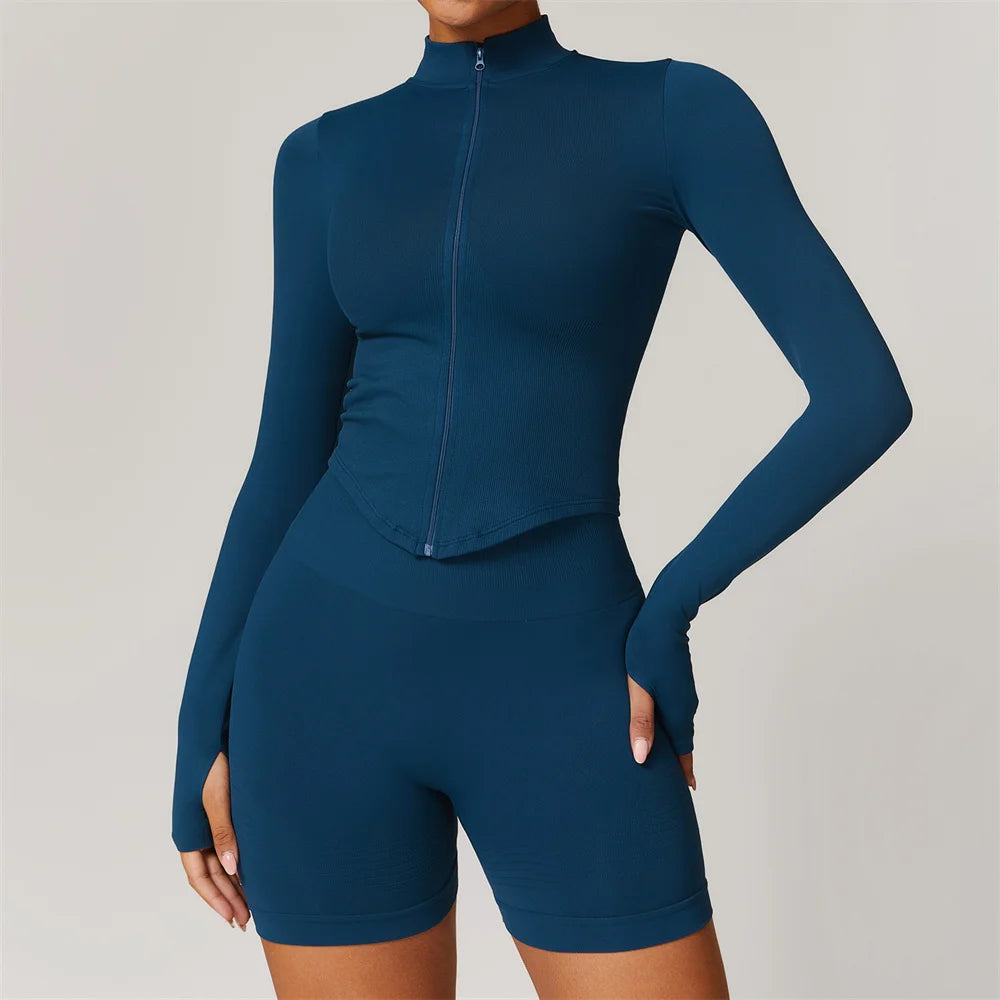 Xooie Fit women's zipper workout set teal long sleeve zip top with thumb holes and high waist biker shorts