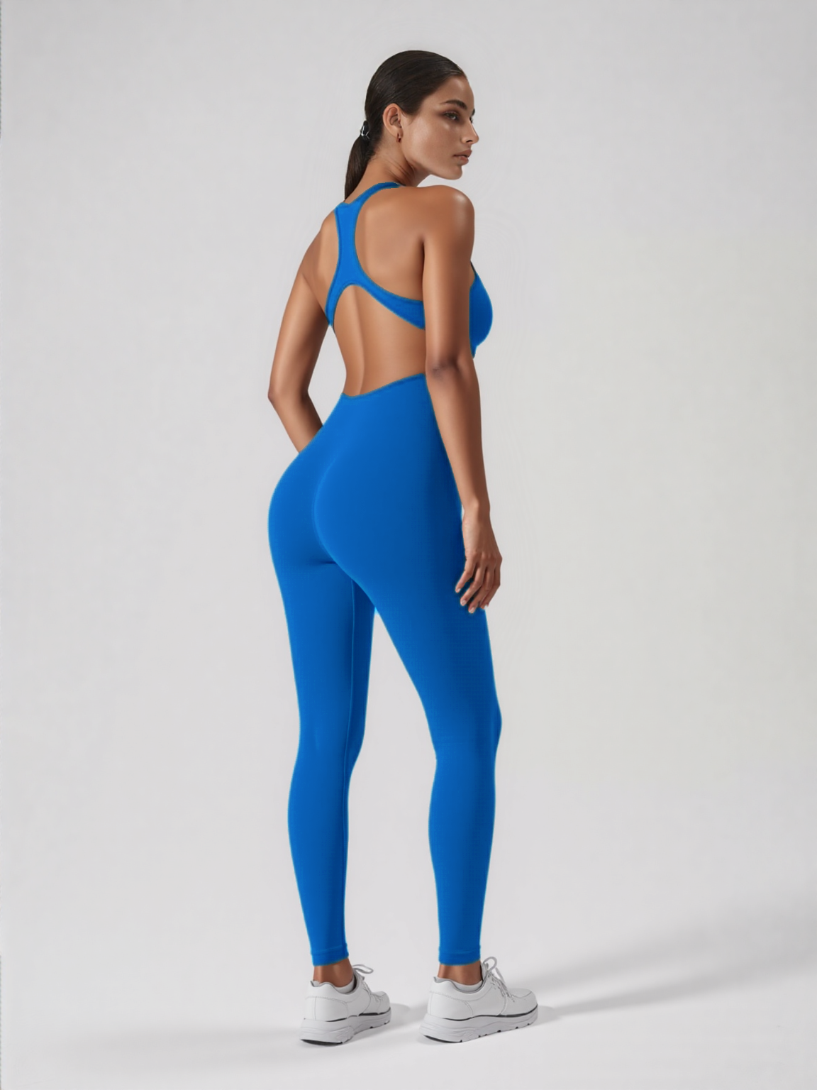 Xooie Fit blue backless workout jumpsuit with racerback cutout full length leggings and supportive fit