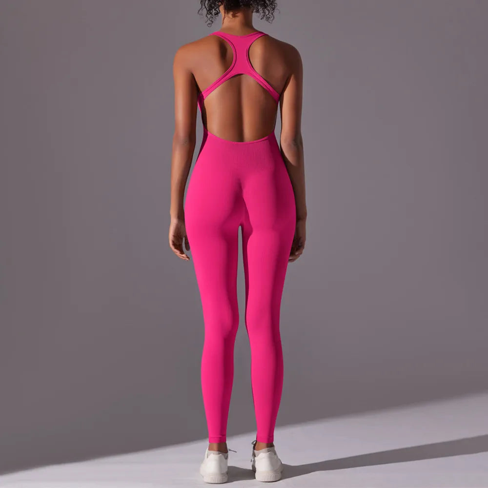 Xooie Fit backless workout jumpsuit in bright pink fitted full length one piece with open racerback