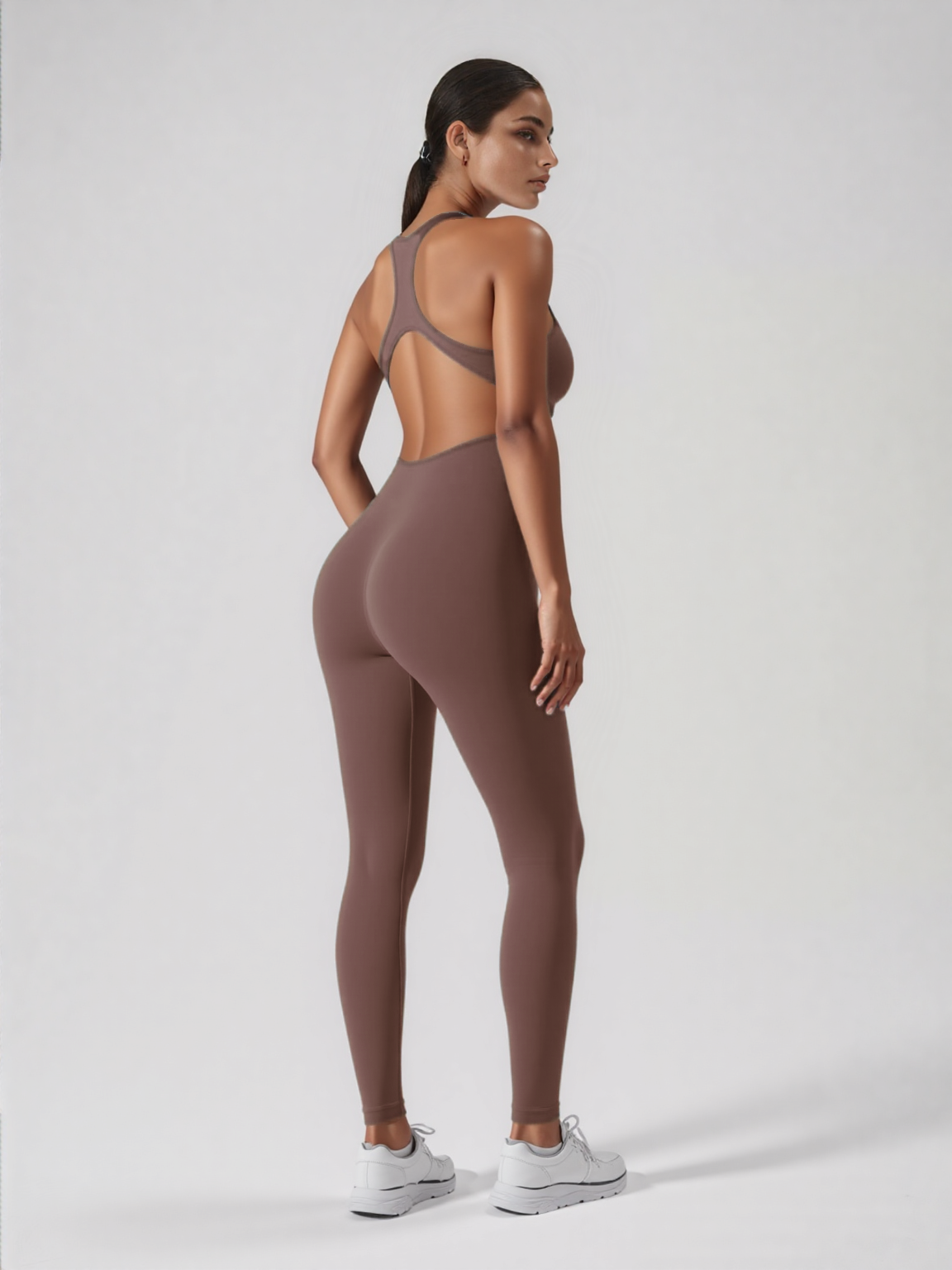 Xooie Fit brown seamless backless workout jumpsuit with racerback cutout and full length leggings