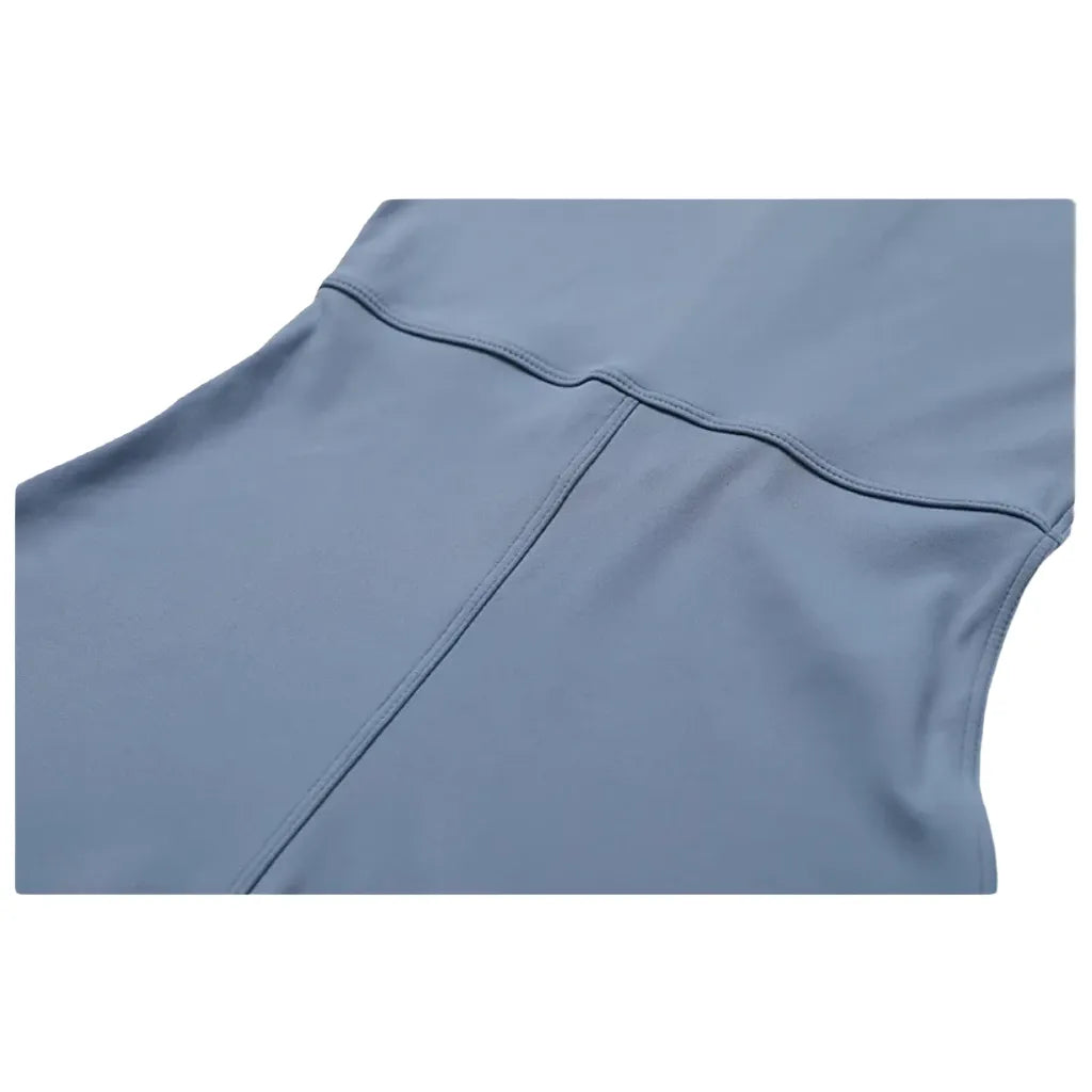 Xooie Fit zipper workout jumpsuit in light blue with a stylish half-zip design for comfort and performance back